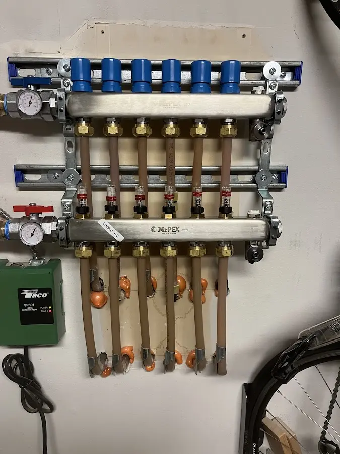 Plumber performing Water Heater Repair at a residential property in Dunmore